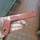 ​WITT: A red metal gun. Pulling the trigger moved a spring mechanism inside but doesn’t so anything else, found in an old work locker (UK)