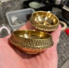 ​What are these small metal bowls I found packaged together in a bag of rice?