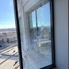 What is this grey 1/2 inch thing that came through my office windows and only broke the outside pane?