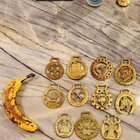 What are these 2-3” brass medallion-looking things that came from an estate sale