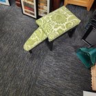 ​Local thrift store find. It’s the size of a standard ottoman but has an odd protrusion and an extra leg. The protruding bit is also fully upholstered with cushioning.