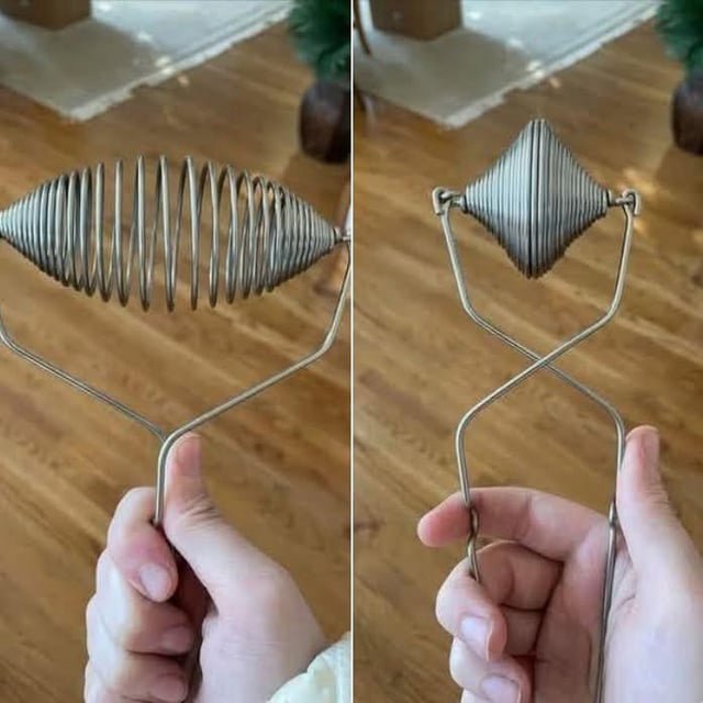 Found on Facebook. Silver metal kitchen(?) thing that is spiral shaped and can be squeezed like tongs to “open”
