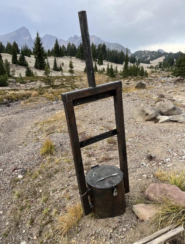 In Oregon: Large, metal frame and cylinder, found in wilderness near hiking trail