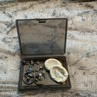 ​Weird condom things, 6.5cm long, white, smells strongly of latex.