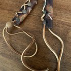 I found these in a bag of jewelry. Made of leather with metal hooks that lace-up.