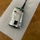 Found at front door. Maybe a pound. Metal, plastic, and electronic components.