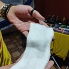 ​Rectalgular, slimy piece of cloth(?) found with my clothes on my wash machine