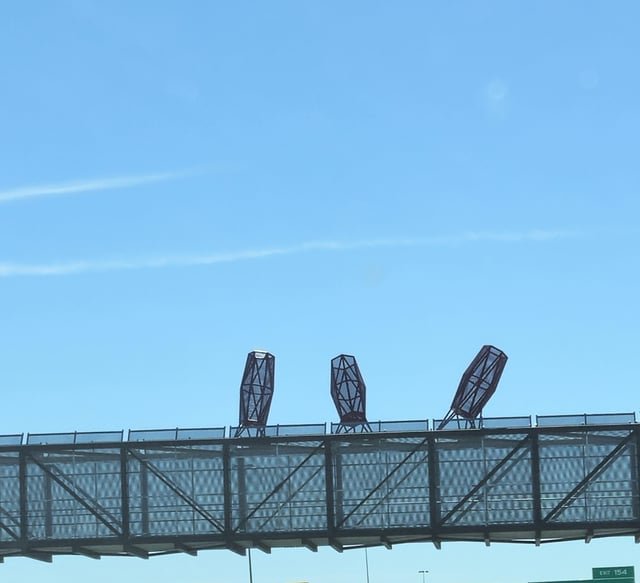 Cage like metal structures over the highway