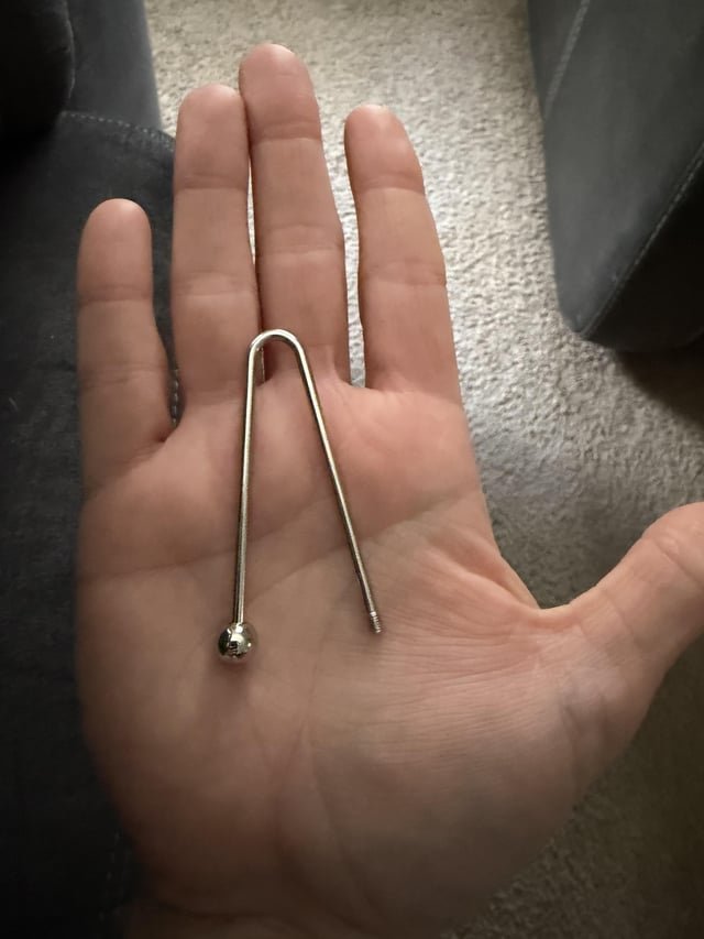 V shaped barbell missing a ball found in the laundry