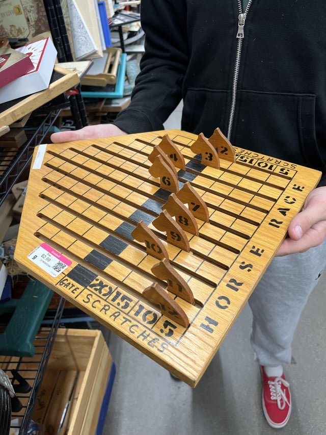 ​Found in a goodwill in AZ… wooden horse racing game board of some kind? The horses slide, there was nothing attached with it either