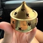 Small gold container with cutout stars