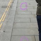 ​Gold metal beads fixed into floor around London