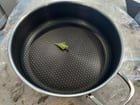 Small greenish yellow silicone funnel-shaped thing that came with sauté pan?