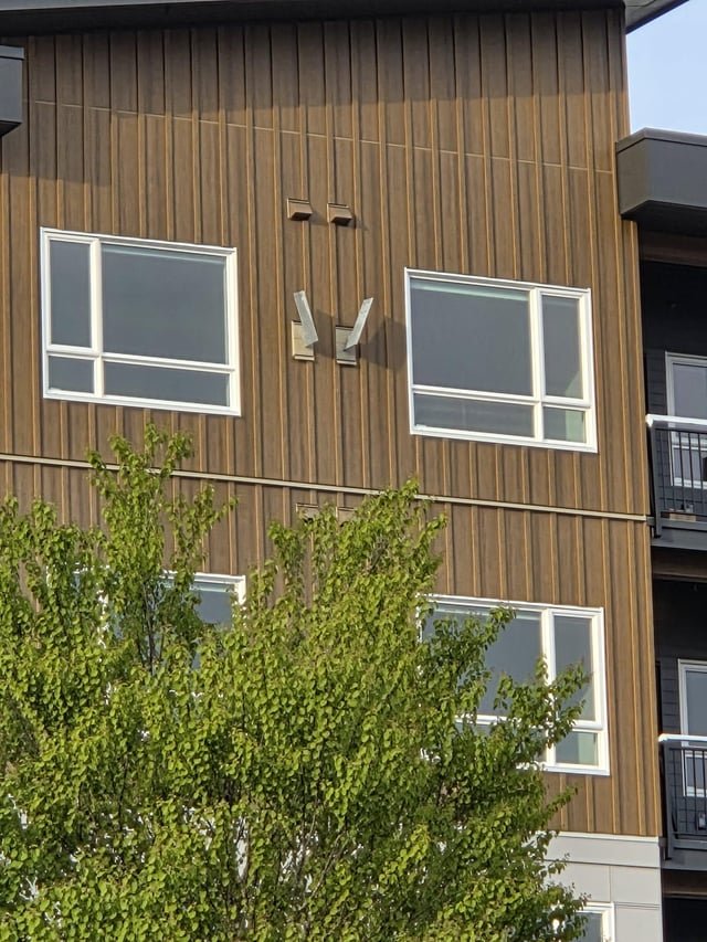 ​New build, weird fin things near top of building, purely decorative?