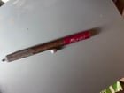 ​Metal spring loaded firing pin pen, with spent “shell”