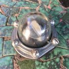 What are this thing I found in a garage? It’s 10cm long, very light, and made of metal and glass. It has a spinning thing in the middle.