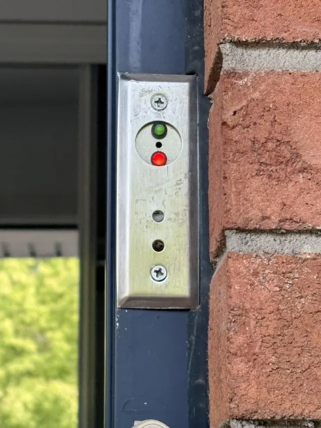 ​These panels with red/green LEDs are all over my new apartment. What are they? Are they safe to remove?