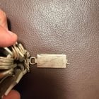 ​Found this small silver metal thing attached to a keyring. Assuming it’s a key of some sort but any idea what it could go to?