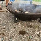 ​Approximately 4’ in diameter, 1-2” thick cast iron extremely heavy duty the bottom is open on the ground or I guess that would be the top as the markings are upside down, markings include serial number? And a letter B or number 8.