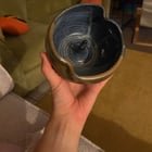 ​What is this weird ceramic bowl with a horn?